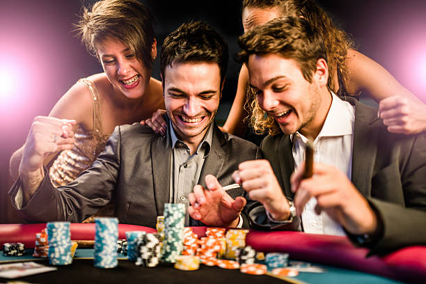 Live casino dealer at multi-camera table with cards and chips
